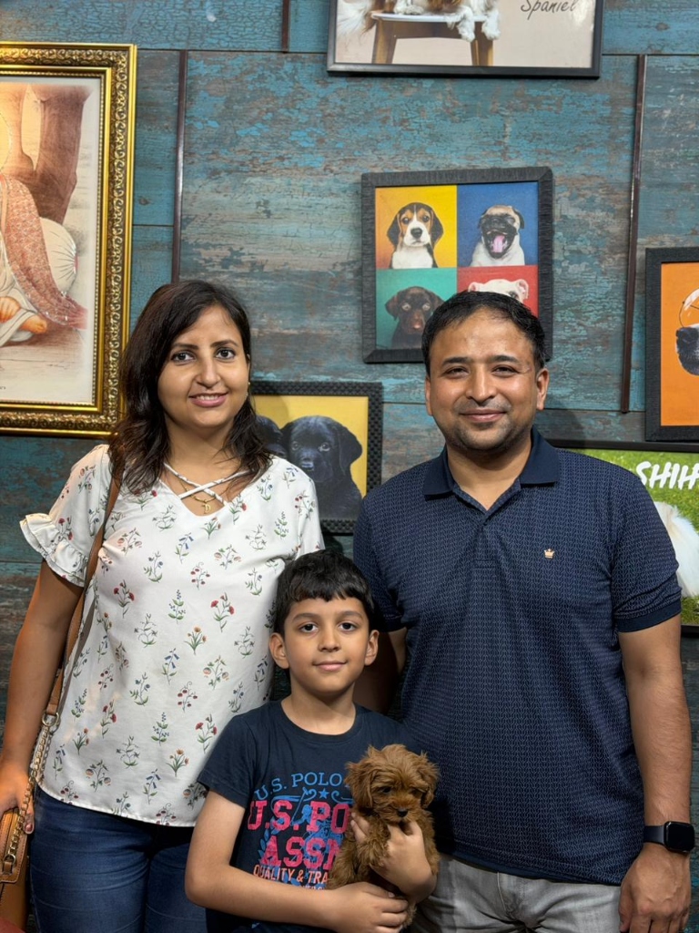 The Sharma Family with Maltipoo